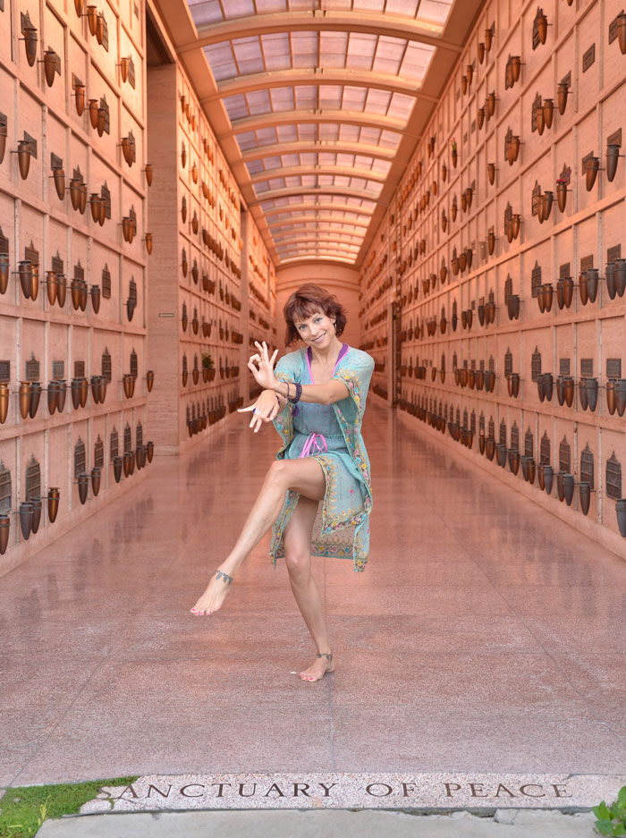 Jeanne doing yoga pose inside the sanctuary of peace