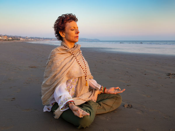 Jeanne on the beacjh in meditation understanding the Subtle Body